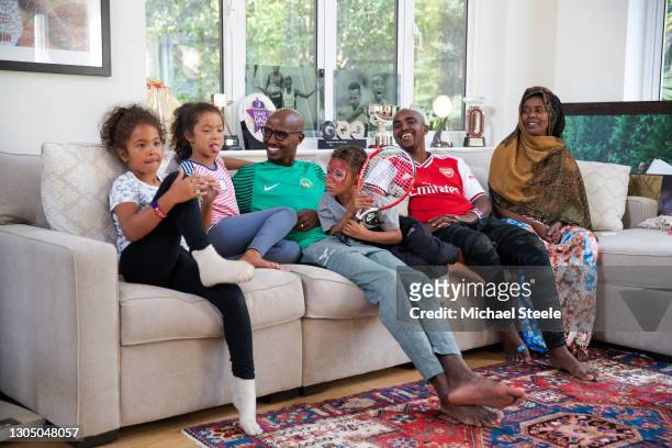 Mo Farah at home with twins Aisha , Amani son Hussein, twin brother Hassan and mother Aisha on July 18, 2019 in Weybridge, England. This image is...