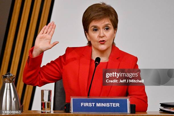 First Minister Nicola Sturgeon gestures as she gives evidence to a Scottish Parliament committee examining the handling of harassment allegations...