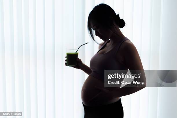 496 Pregnant Belly Silhouette Stock Photos, High-Res Pictures, and
