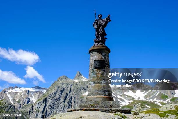 st. bernard of clairvaux, statue of st. bernard, grand saint-bernard, great st. bernard pass, col du grand-saint-bernard, colle del gran san bernardo, valais alps, aosta valley, italy - bernhard von clairvaux stock pictures, royalty-free photos & images