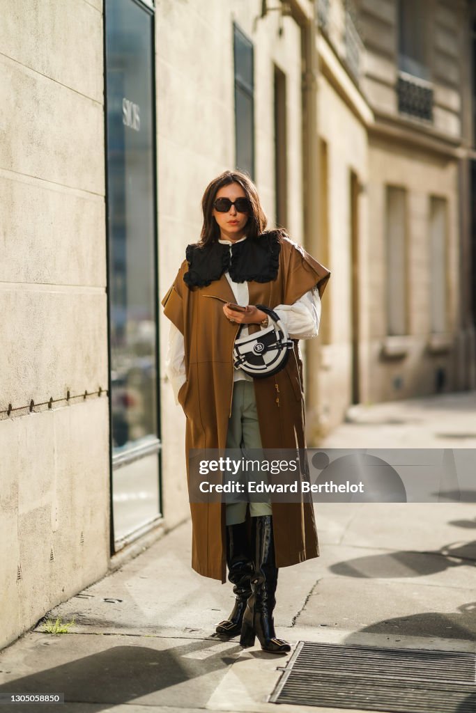 Street Style - Paris Fashion Week Womenswear Fall/Winter 2021/2022
