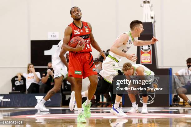 Cameron Gliddon of the Phoenix is called for a foul on Bryce Cotton of the Wildcats that send him to the free throw line to put the Wildcats in front...