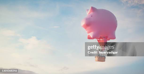 piggy bank,3d render - heißluftballon stock-fotos und bilder