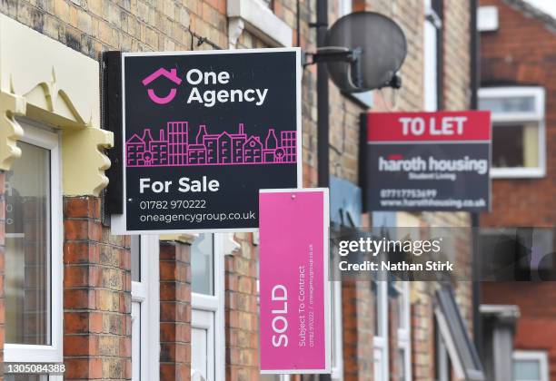 Placards from Once Agency estates agents advertising properties For Sale and Sold on March 03, 2021 in Stoke-on-Trent, England. UK Chancellor, Rishi...