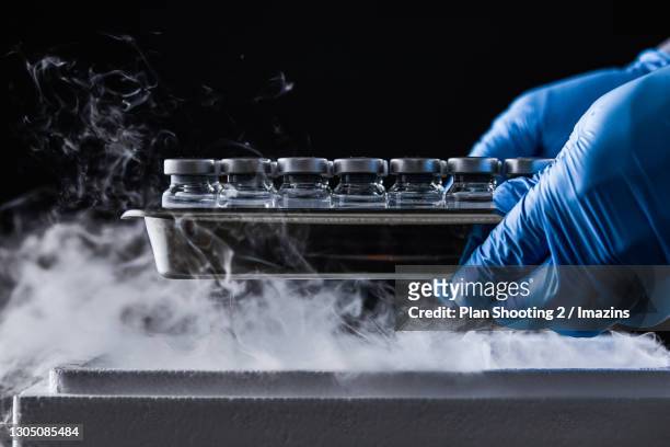 covid-19, vaccination, vaccine - dry ice stock pictures, royalty-free photos & images