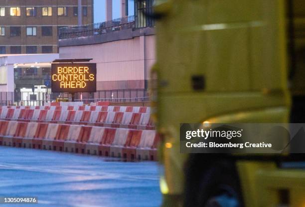 truck approaching border controls - dover stock pictures, royalty-free photos & images