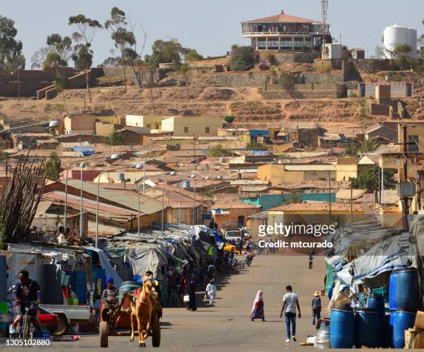 metera street and the cherhi recreation center, asmara, eritrea - eritrea stock pictures, royalty-free photos & images