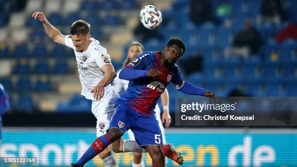 Stefan Kutschke of Ingolstadt and Assani Lukimya of Uerdingen go up for a header during the 3. Liga match between KFC Uerdingen 05 and FC Ingolstadt...