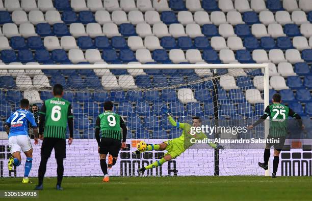 Domenico Berardi of U.S. Sassuolo Calcio scores their sides second goal from the penalty spot past Alex Meret of SSC Napoli during the Serie A match...