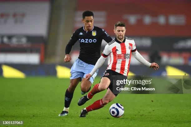 Oliver Norwood of Sheffield United battles for possession with Jacob Ramsey of Aston Villa during the Premier League match between Sheffield United...