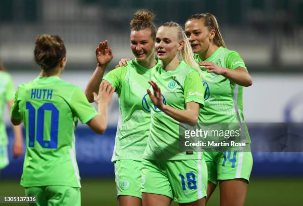 Alexandra Popp of Vfl Wolfsburg celebrates with teammates Svenja Huth, Karina Saevik, and Fridolina Rolfo after scoring their team's second goal...