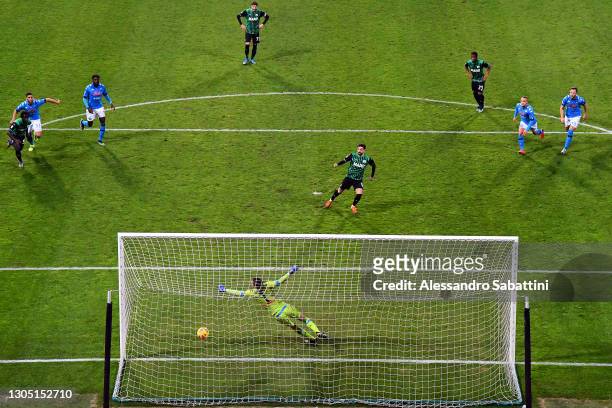 Francesco Caputo of Sassuolo scores their team's third goal from the penalty spot past Alex Meret of Napoli during the Serie A match between US...