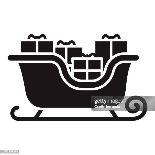 santa's sleigh christmas glyph icon - tobogganing stock illustrations