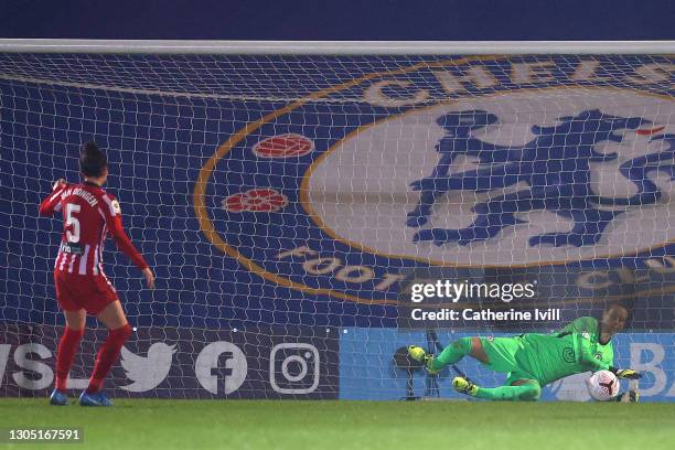 Ann-Katrin Berger of Chelsea saves a penalty took by Merel van Dongen of Atletico de Madrid during the Women's UEFA Champions League Round of 16...