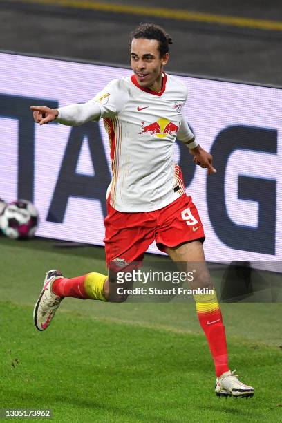 Yussuf Poulsen of RB Leipzig celebrates after scoring their side's first goal during the DFB Cup quarter final match between RB Leipzig and VfL...