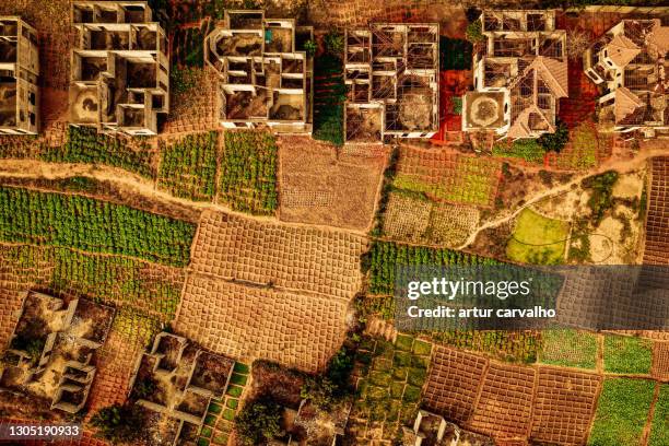 empty houses and ruins landscape from above - angola drone stock pictures, royalty-free photos & images