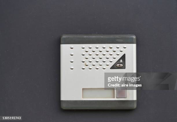 close-up of a modern doorbell. - door close button stock-fotos und bilder