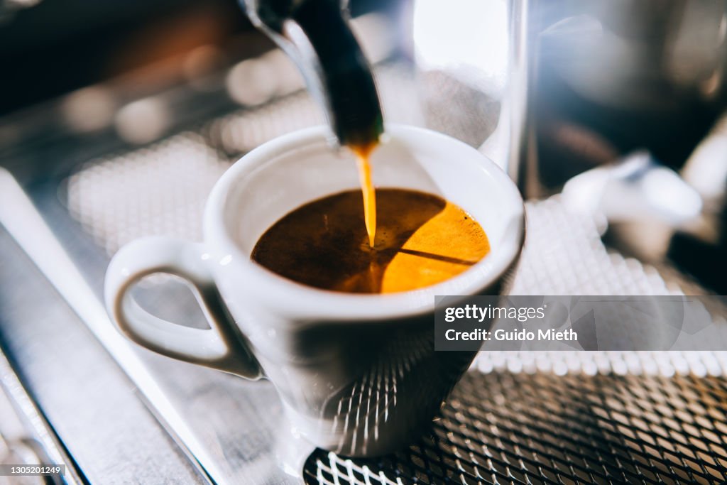 Wonderful espresso shot pouring out.