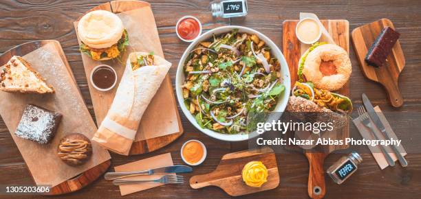 table top view of vegan gluten-free food. - brotzeitbrett stock-fotos und bilder