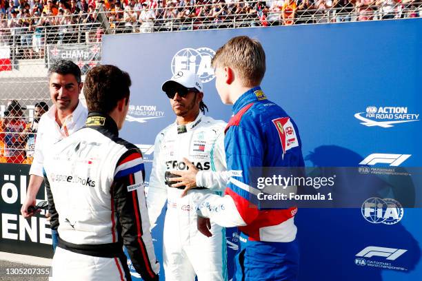 Champion Nyck De Vries , F1 champion Lewis Hamilton, Mercedes AMG F1, and F3 champion Robert Shwartzman PREMA Racing during the Abu Dhabi at Yas...