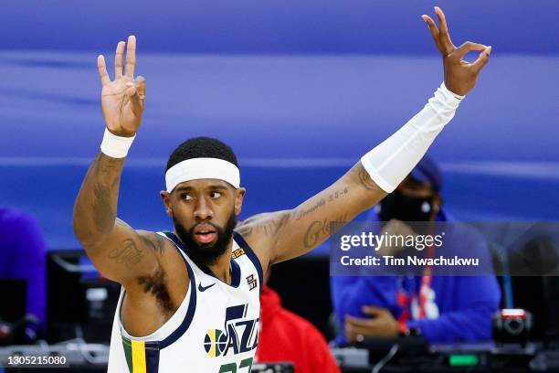 Royce O'Neale of the Utah Jazz celebrates a three point basket during the second quarter against the Philadelphia 76ers at Wells Fargo Center on...