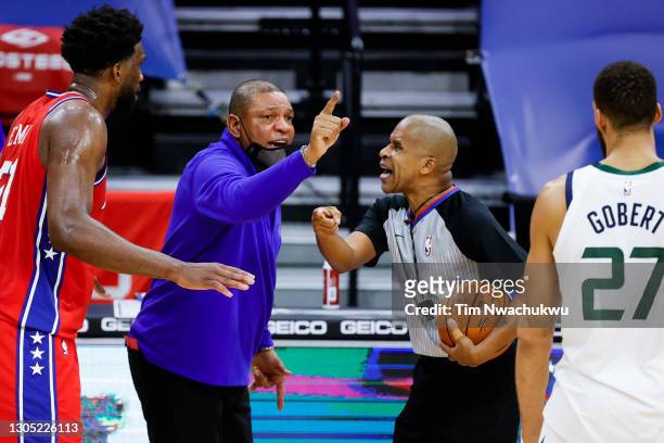 Head coach Doc Rivers of the Philadelphia 76ers speaks with referee Sean Corbin during overtime at Wells Fargo Center on March 03, 2021 in...