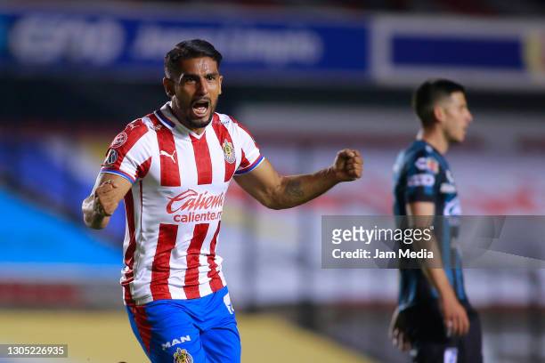 Miguel Ponce of Chivas celebrates after scoring the second goal of his team during the 9th round match between Queretaro and Chivas as part of the...