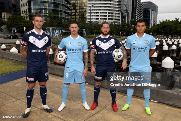 Melbourne Victory players, Nick Ansell and Jacob Butterworth pose for a photo with Melbourne City players, Jamie Maclaren and Andrew Nabbout during...