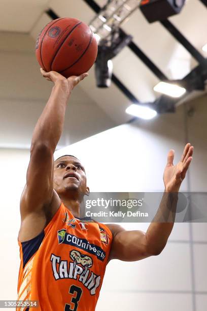 Scott Machado of the Taipans drives to the basket during the NBL Cup match between the Cairns Taipans and the Sydney Kings at the State Basketball...