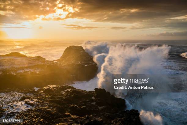 storm on the sea with dramatic clouds at sunset. portugal - strapiombo foto e immagini stock