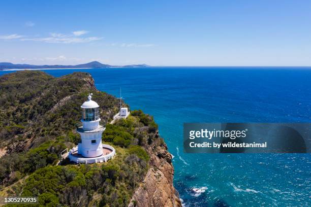 aerial view of sugarloaf point lighthouse, seal rocks, nsw, australia. - headland stock pictures, royalty-free photos & images