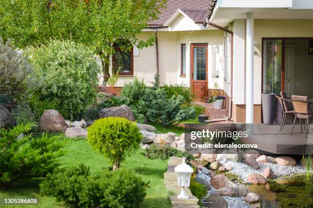 beautiful country house and garden and pond - brooks gardner stock pictures, royalty-free photos & images