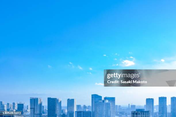 afternoon distant view of tokyo from tsukiji - blue sky stock pictures, royalty-free photos & images