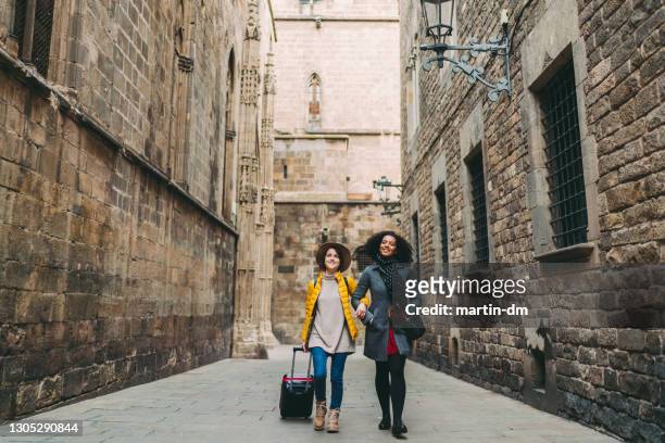 friends on holiday in spain - winter barcelona stock pictures, royalty-free photos & images