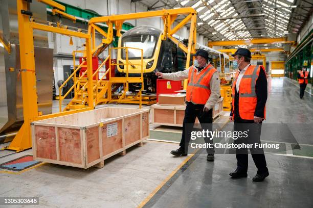 British leader of the Labour Party, Sir Keir Starmer tours Alstom, formerly Bombardier, train manufacturers during a post-budget visit on March 04,...