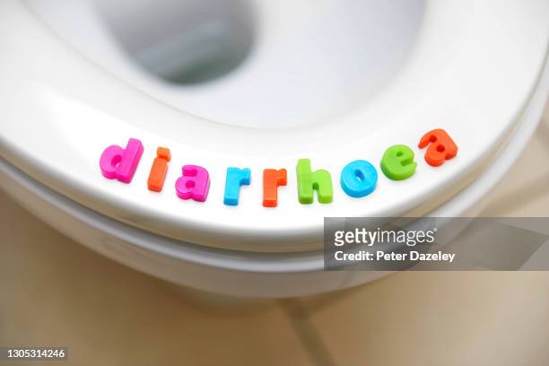 diarrhoea on toilet seat - norovirus fotografías e imágenes de stock