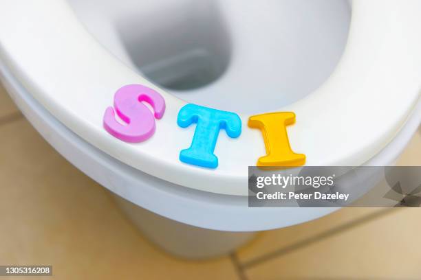 sti on toilet seat - chlamydia stock pictures, royalty-free photos & images