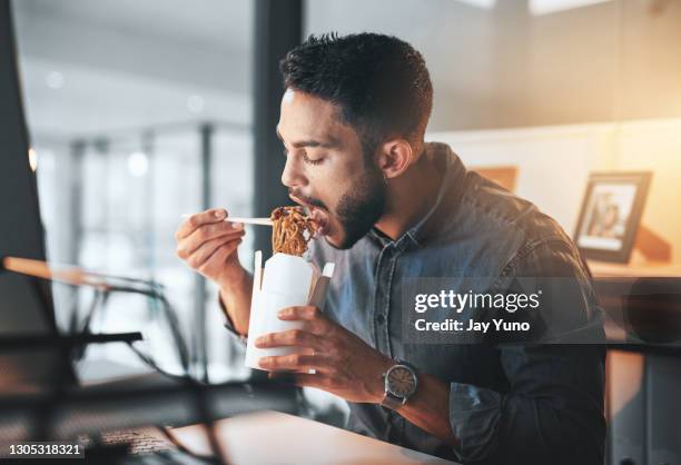 work makes me incredibly hungry! - noodles eating stock pictures, royalty-free photos & images