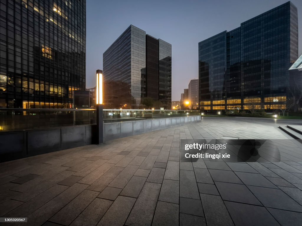 Facades of modern buildings in the business district of Hangzhou, China in the evening
