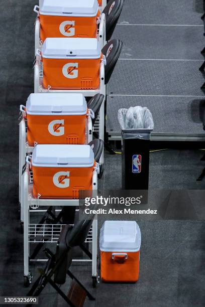 Gatorade coolers sit on the sidelines during a game between the Atlanta Hawks and Orlando Magic at Amway Center on March 3, 2021 in Orlando, Florida....