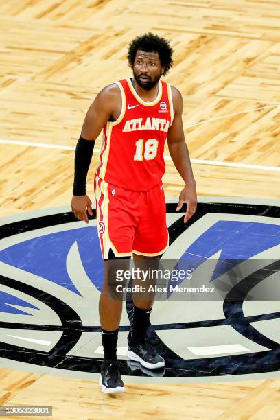 Solomon Hill of the Atlanta Hawks plays defense against the Orlando Magic at Amway Center on March 3, 2021 in Orlando, Florida. NOTE TO USER: User...