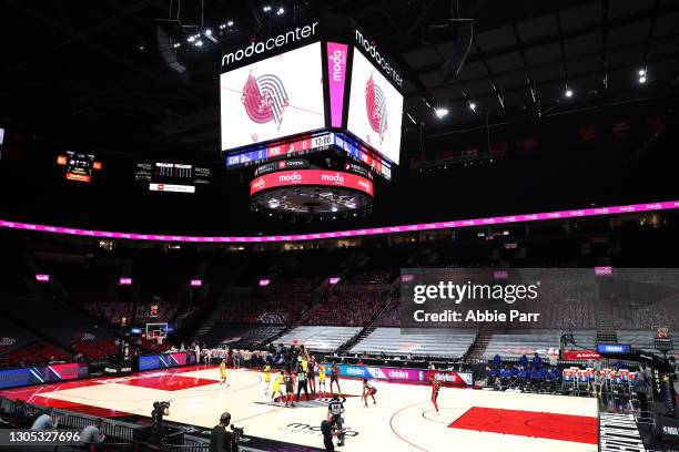 General view of tip-off is seen between the Portland Trail Blazers and Golden State Warriors at Moda Center on March 03, 2021 in Portland, Oregon....