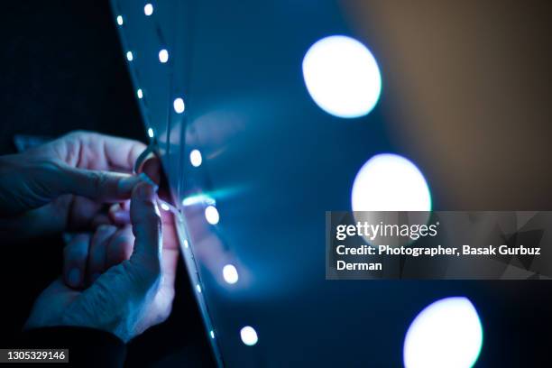 installing tape led light - igniting stock pictures, royalty-free photos & images