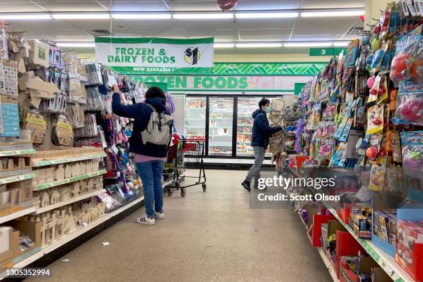 Customers shop at a Dollar Tree store on March 04, 2021 in Chicago, Illinois. Dollar Tree said that it will open 600 new stores this year, 400 under...