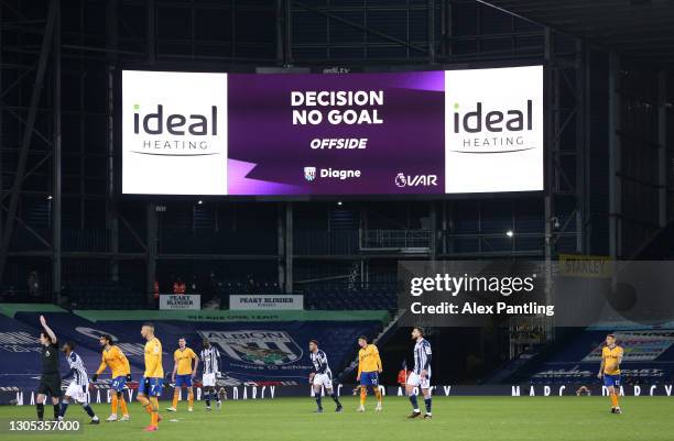 The VAR decision to disallow a goal scored by Mbaye Diagne of West Bromwich Albion for offside is displayed on the LED board during the Premier...