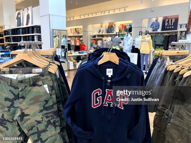 Gap clothing is displayed at a Gap store on March 04, 2021 in San Francisco, California. Gap Inc. Will report fourth quarter earnings today after the...