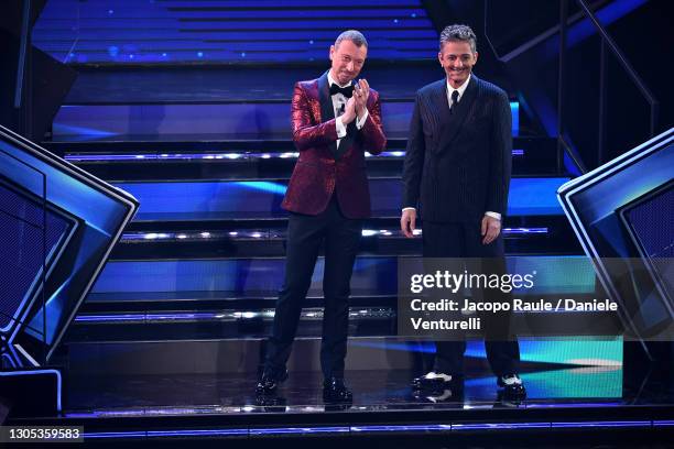 Amadeus and Fiorello are seen on stage during the 71th Sanremo Music Festival 2021 at Teatro Ariston on March 04, 2021 in Sanremo, Italy.
