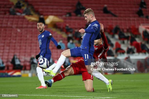 Timo Werner of Chelsea is challenged by Ozan Kabak of Liverpool as he scores a goal which is disallowed for offside following a VAR review during the...