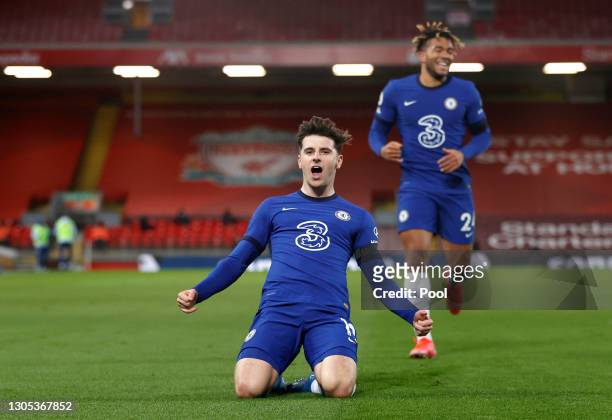 Mason Mount of Chelsea celebrates after scoring his team's first goal during the Premier League match between Liverpool and Chelsea at Anfield on...