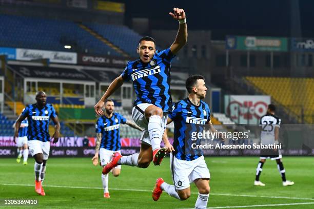 Alexis Sanchez of FC Internazionale celebrates after scoring his team's first goal during the Serie A match between Parma Calcio and FC...